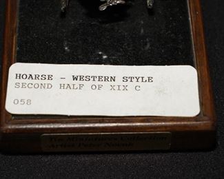 There are two solder horse & carriages