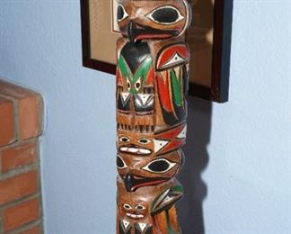 Tall hand carved bird totem by Ray Williams