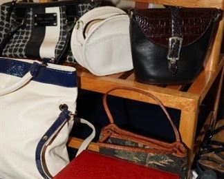 We have beautiful designer handbags, clothing, shoes, scarves and accessories...for your buying enjoyment!