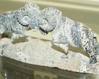Marble carved dueling rams