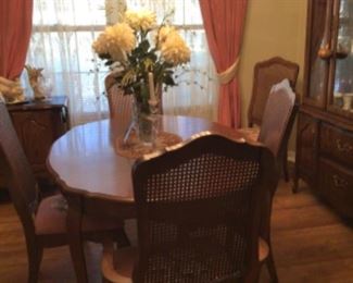 Broyhill dining table, scalloped edge w/ 1 leaf. $275. Chairs NOT available.