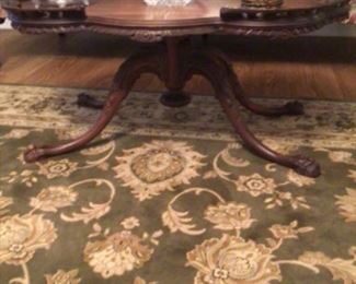 8x10 area rug , Kashmir Collection $110; Ornate carved scalloped edge pedestal coffee table $200.