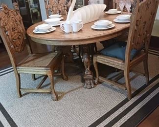 incredible carved table and chairs