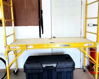 Portable adjustable scaffolding just out of box condition & rolling patio storage box    