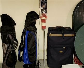 Golf clubs & bags, fishing pole, flag, luggage & coller