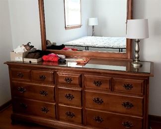 Nine drawer dresser w/mirror, lamp & assorted items