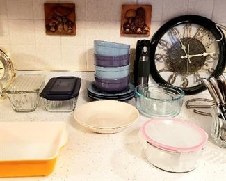 Two Corelle bowls, square baking dish, assorted flatware, loaf dishes, 8 piece bowl set, clock etc.