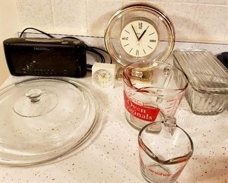 Radio, large glass lid, clock & two measuring cups
