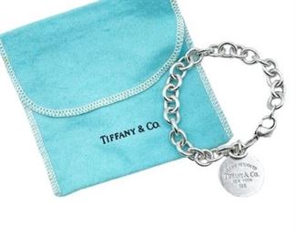 Lot 002-1
Tiffany & Co., “Please Return To Tiffany & Co ” Round Charm Bracelet