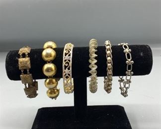 Gold Colored and Silver Colored Bracelets