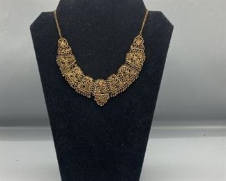 Gold Colored Silhouetted Shapes Necklace and Bracelet