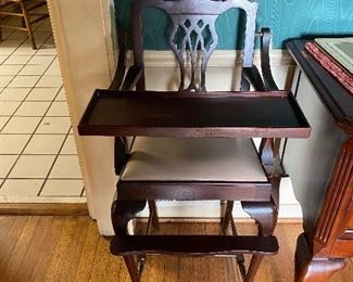 Who doesn't need an antique mahogany baby chair?