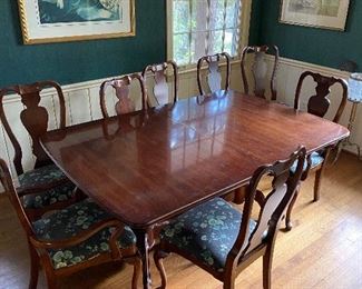 Superb Queen Anne dining table with two additional leaves and 8 chairs.