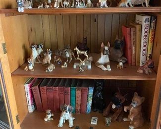 The largest collection of Boxer figurines I have ever seen. Names like Selb, Lefton, and more.