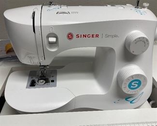 very nice Singer sewing machine with sewing table