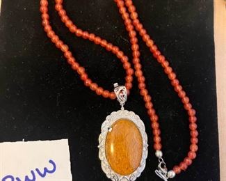 Orange Beads and Stone