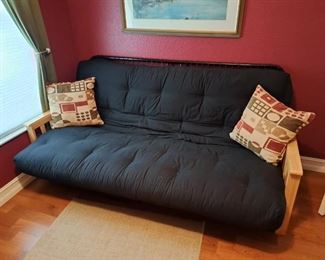 Futon sofa converts to a bed 
$120