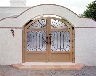 This magnificent gate is the entrance to this large Paradise Valley Spanish Style Home.