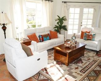 This beautiful living room arrangement includes a very comfortable power recliner, loveseat and sofa.