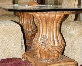 Side detail of the carved wood pedestal bases 