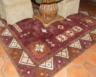 This wool floor rug is a favorite with the bright & vibrant colors and geometrical shapes
