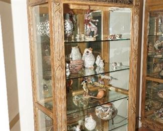There are a pair of these Schnadic lighted glass front display cabinets.