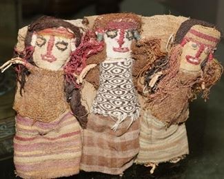 Antique dolls on burlap