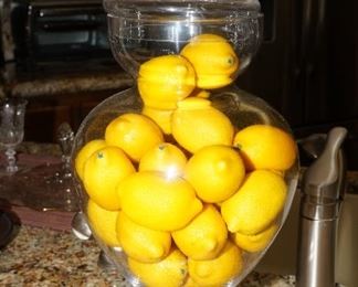 Apothecary jar with faux lemons