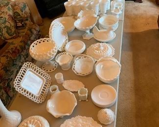 Lots of milk glass....a dozen bud vases not pictured