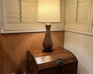 vintage lamp and wooden trunk