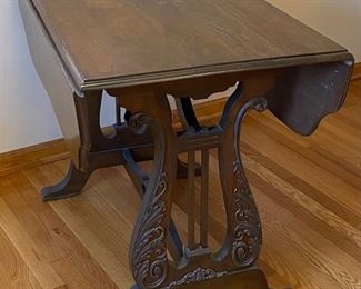 Antique Drop Leaf Harp Table (leaves up) about 41” x 41” & ~30” tall ; (leaves down) approximately 22” x 41”.