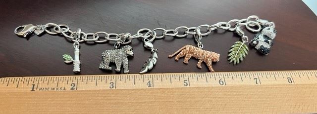 #J4 Swarovski Charm Bracelet with animals and additional tiger and other charms.  Price $30.00