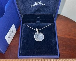#J5 Swarovski Shell Pendant on silver chain.  Price $20.00
