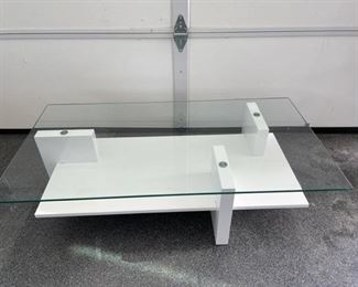 $200 USD      Anora Glossy White Glass Top Cocktail Table BC60-11239     Description: Anora Glossy White Glass Top Cocktail Table. Clean lines with a minimal aesthetic. The tempered clear glass creates a visually light table top to complement the heavier white enamel base.

Condition: Table is in good condition with only minor signs of wear commensurate with use and age. 

Dimensions:  49  x 25.5 x 13.5"h

Local pick up Germantown, MD.  Contact us for shipper suggestions.     https://goodbyhello.com/products/anora-glossy-white-glass-top-cocktail-table-bc60-11240?_pos=5&_sid=ee59c6cb0&_ss=r