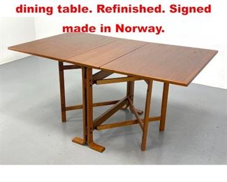 Lot 8 Norwegian teak Gate leg dining table. Refinished. Signed made in Norway. 