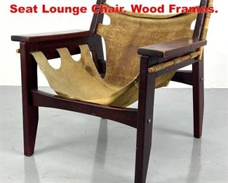 Lot 174 Safari style Leather Sling Seat Lounge Chair. Wood Frames. 