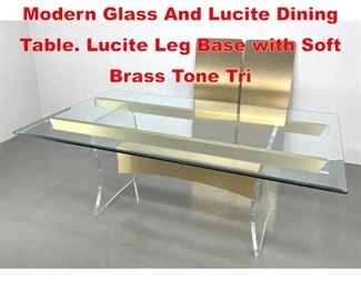 Lot 183 Decorator Mid Century Modern Glass And Lucite Dining Table. Lucite Leg Base with Soft Brass Tone Tri
