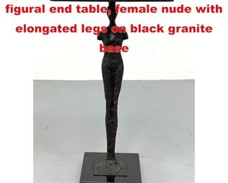 Lot 197 Giacometti style bronze figural end table, female nude with elongated legs on black granite base