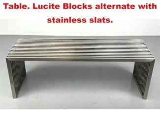 Lot 242 Stainless Slat Bench Coffee Table. Lucite Blocks alternate with stainless slats. 