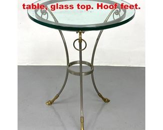 Lot 271 Jansen style Gueridon table, glass top. Hoof feet. 
