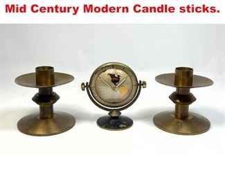 Lot 337 Metal lot. Small Clock and Mid Century Modern Candle sticks. 