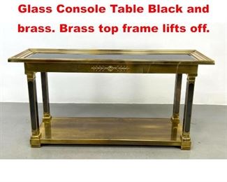 Lot 379 MASTERCRAFT Brass and Glass Console Table Black and brass. Brass top frame lifts off. 