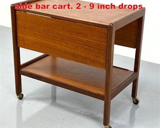 Lot 387 Danish Modern Teak drop side bar cart. 2 9 inch drops.