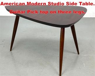 Lot 392 Philip Powell Attribution American Modern Studio Side Table. Guitar Pick top on three legs. 