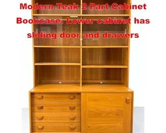Lot 427 DOMINO MOBLER Danish Modern Teak 2 Part Cabinet Bookcase. Lower cabinet has sliding door and drawers