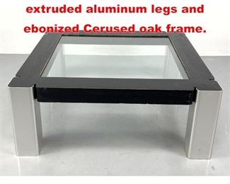 Lot 487 Square Glass coffee table extruded aluminum legs and ebonized Cerused oak frame. 