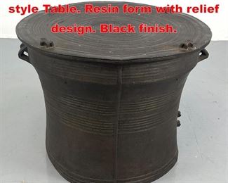 Lot 523 Southeast Asian Rain Drum style Table. Resin form with relief design. Black finish. 