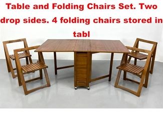 Lot 525 Space Saving Drop Side Table and Folding Chairs Set. Two drop sides. 4 folding chairs stored in tabl
