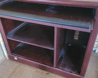 Computer desk with slide out tray