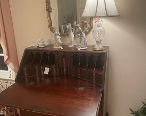 Drop front desk- opened. Lladros